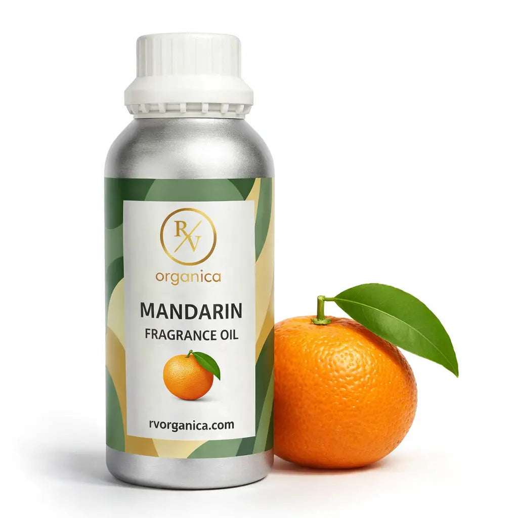 Bottle of Mandarin Fragrance Oil by RV Organica with a mandarin orange and leaf on a white background