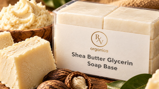 RV Organica Shea Butter Glycerin Soap Base pack beside a block of raw shea butter, whipped shea in a wooden bowl and whole shea nuts