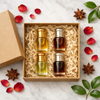 "Natural attar perfume oil gift set of 4 bottles in kraft gift box with rose petals and star anise, perfect for gifting"