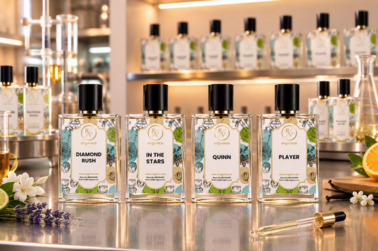 Premium fragrance oil bottles displayed in a professional fragrance collection with essential oil bottles in the background