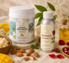 High-end organic skincare composition with RV Organica products, nourishing body butter, herbal oils, floral petals, and clean luxury wellness aesthetic under natural soft lighting