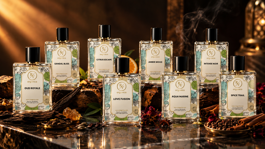 Luxury perfume bottles arranged on dark marble with oud, spices, and warm golden lighting for a premium fragrance collection