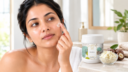 Indian woman dabbing a small amount of shea butter on her cheek beside an RV Organica Shea Butter jar and a bowl of raw shea butter