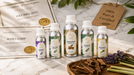 Certified essential oil aluminum bottles with ISO 9001:2015 and WHO-GMP certificates, natural botanicals and premium product display on white marble.