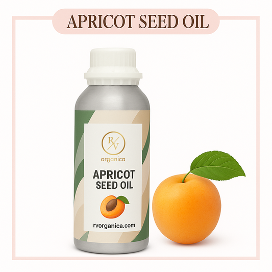 A bottle of apricot seed oil with a fresh apricot fruit and leaf in the foreground. The label on the bottle reads 'APRICOT SEED OIL' with a website address 'rvorganica.