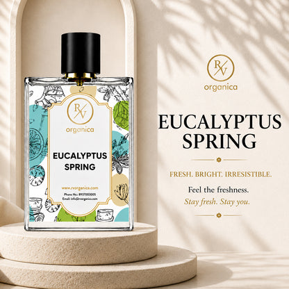 RV Organica Eucalyptus Spring essential oil bottle with botanical label displayed on a premium stone pedestal, natural eucalyptus-inspired fragrance packaging, luxury aromatherapy product.