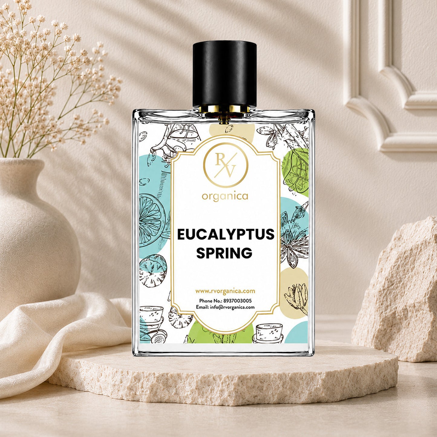 RV Organica Eucalyptus Spring perfume bottle displayed on a natural stone pedestal with elegant neutral décor, premium eucalyptus fragrance product photography.