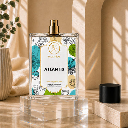 RV Organica Atlantis fragrance oil glass bottle with gold spray top in elegant product display
