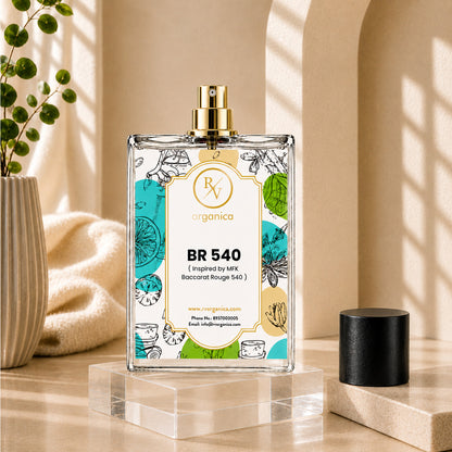 RV Organica BR 540 Premium Fragrance Oil bottle displayed on a clear acrylic stand in a luxury beige setting