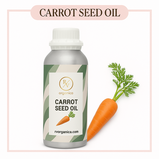 A bottle of Carrot Seed Oil with a fresh carrot next to it, against a white background with the text 'CARROT SEED OIL' and a website address.