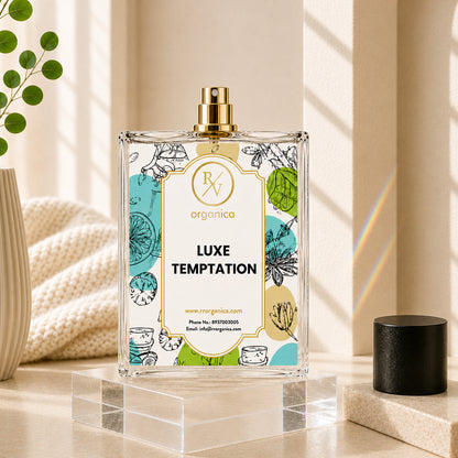 RV Organica Luxe Temptation inspired fragrance displayed on a luxury pedestal in a modern setting, featuring an elegant perfume for men and women.