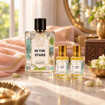 In The Stars perfume with Vanilla and Jasmine Attar on a vanity table