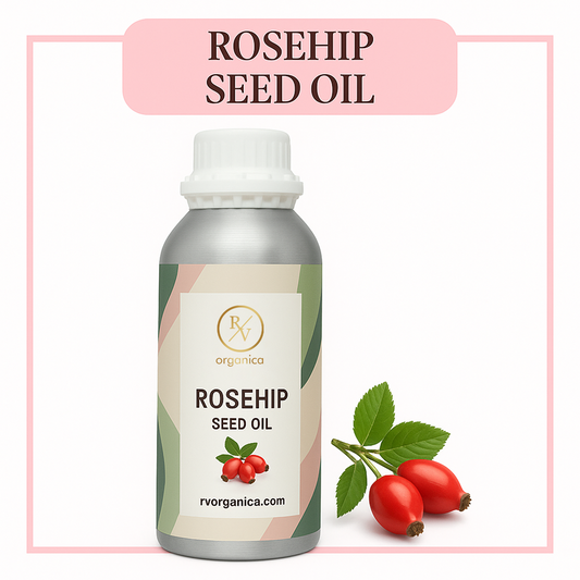 A bottle of Rosehip Seed Oil with a label showing the product name and a few rosehip fruits. The background is white with a pink rectangular border.