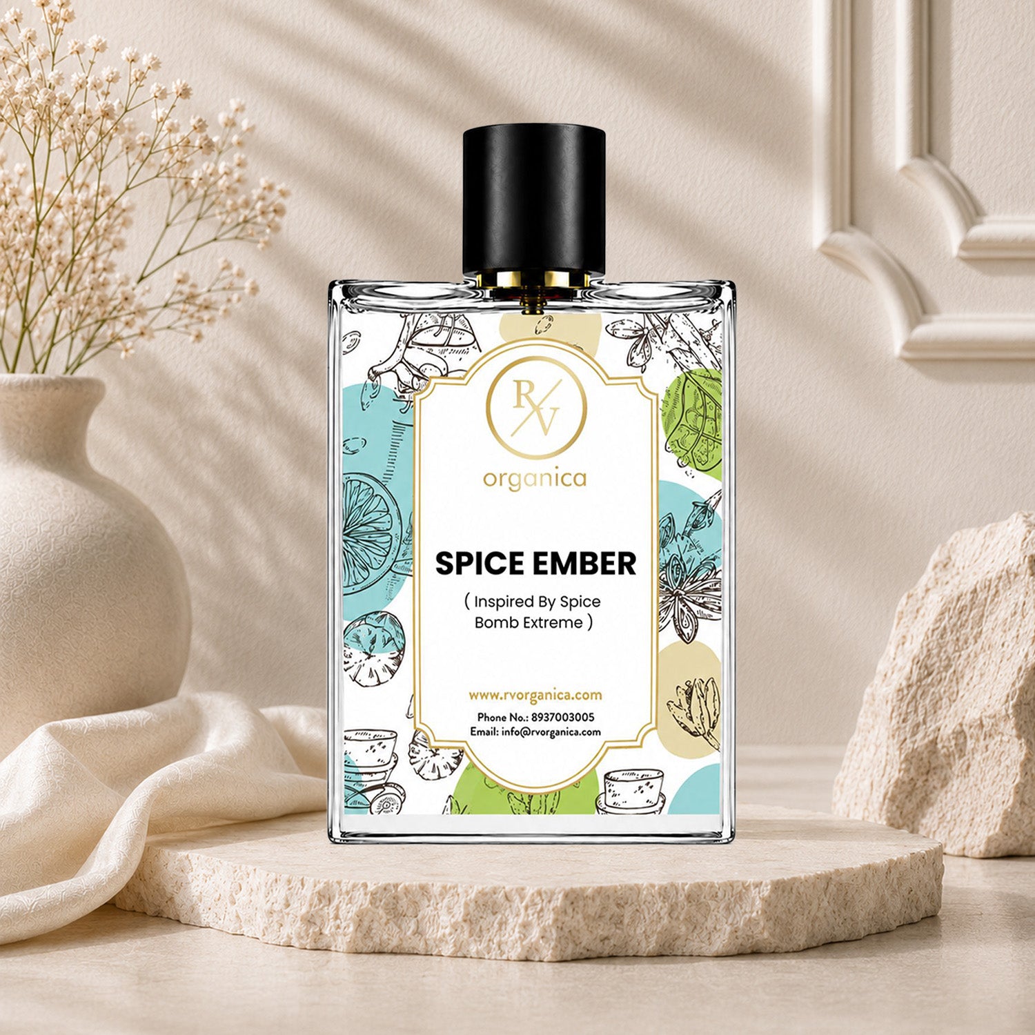 RV Organica Spice Ember premium fragrance oil in a clear glass bottle with a minimalist luxury setting, inspired by Spice Bomb Extreme for perfume and fragrance formulations.