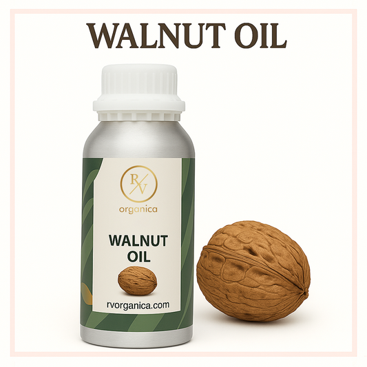 A bottle of walnut oil with a walnut directly next to it, both on a white background with the text 'WALNUT OIL' and 'rvorganica.com'.