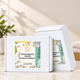 RV Organica White Beeswax Pellets DIY Candle Making Kit white gift boxes with branded labels on a marble surface