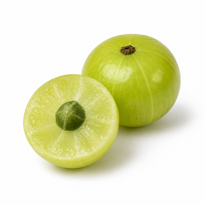 Fresh Indian gooseberry (amla) fruits with one cut in half showing seed on white background - Amla Oil source ingredient