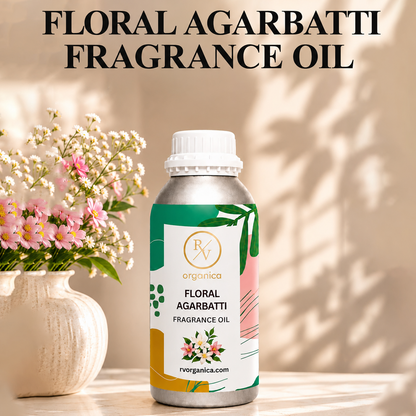 Floral Agarbatti Fragrance Oil in a premium aluminium bottle with an elegant floral background, showcasing its luxurious floral incense aroma for agarbatti, candles, soaps, perfumes, and home fragrance products.