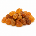 Natural myrrh resin pieces on a white background
