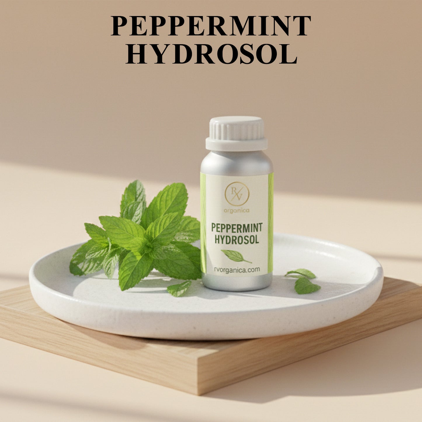 Organic Peppermint Hydrosol facial mist bottle with fresh mint leaves, natural cooling skin toner for hydration and daily skincare routine.
