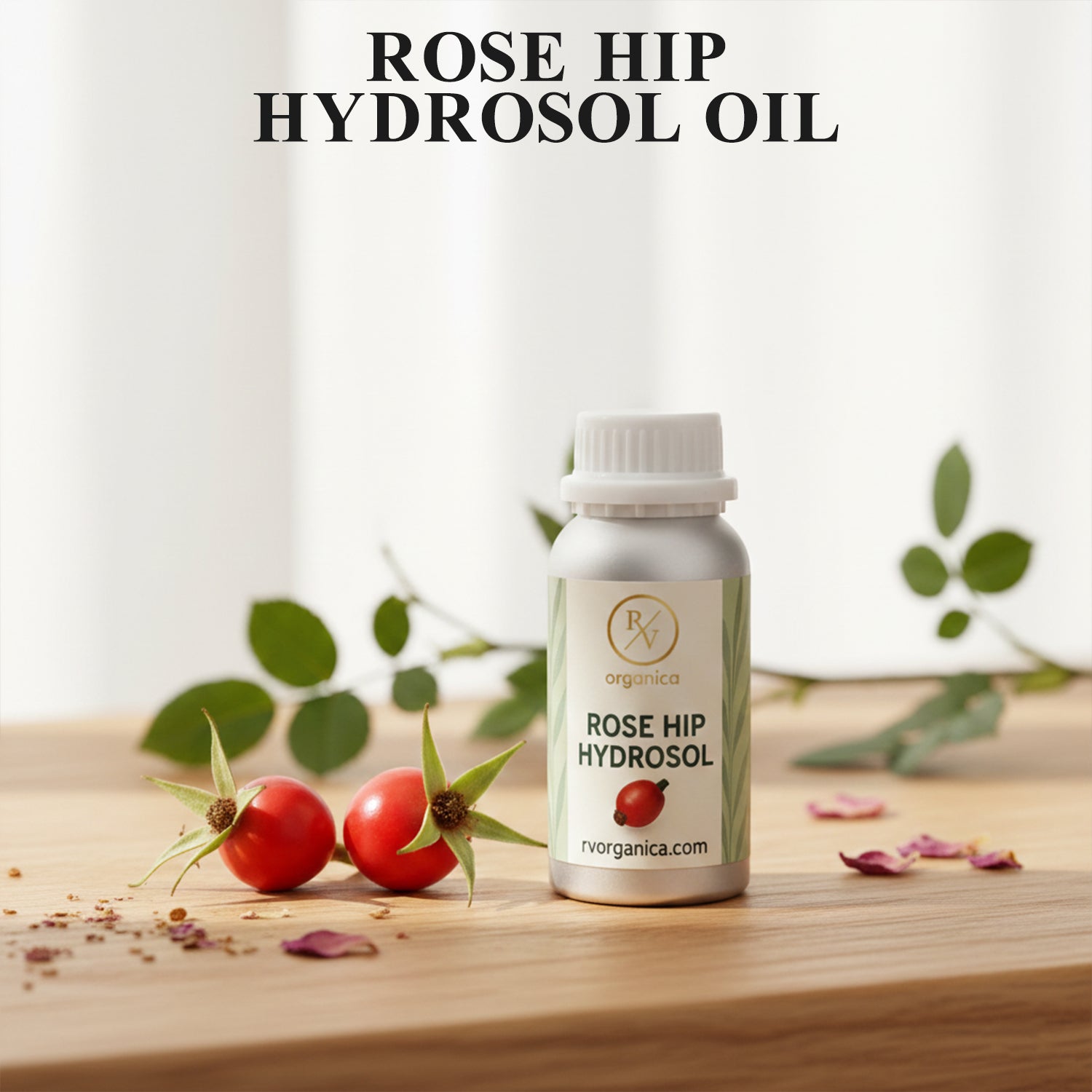 Organic Rose Hip Hydrosol facial mist bottle with fresh rose hips and leaves, natural skin toner for hydration, glow and daily skincare routine.