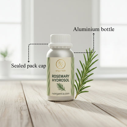 Rosemary Hydrosol in aluminium bottle with sealed pack cap, natural organic skincare toner with fresh rosemary sprigs on wooden surface.