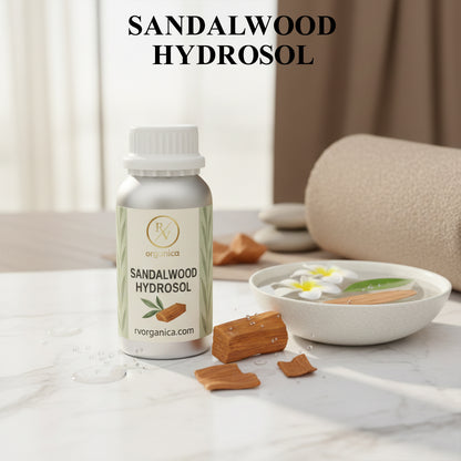 Organic Sandalwood Hydrosol facial mist bottle with sandalwood pieces and spa setting, natural skin toner for hydration and glow.