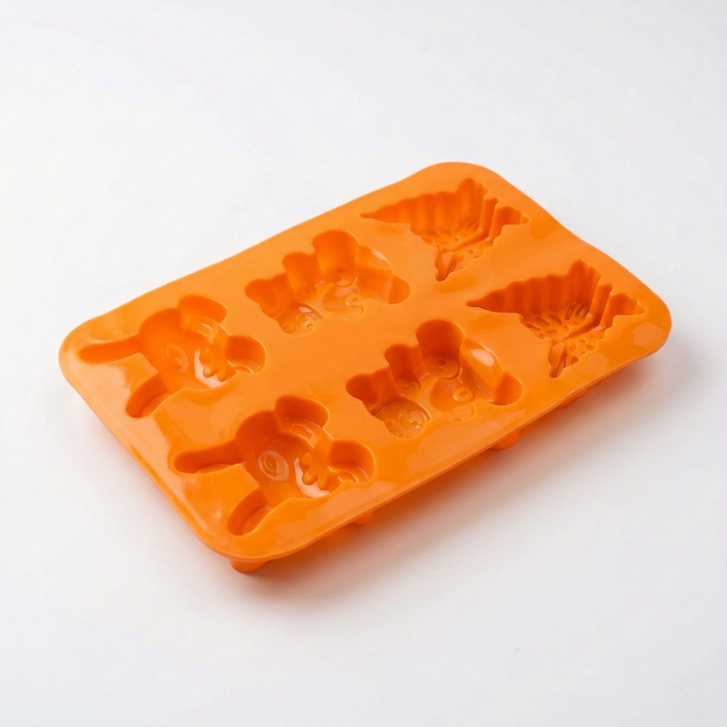 Orange silicone mould for candle & soap making with bunny teddy butterfly shapes