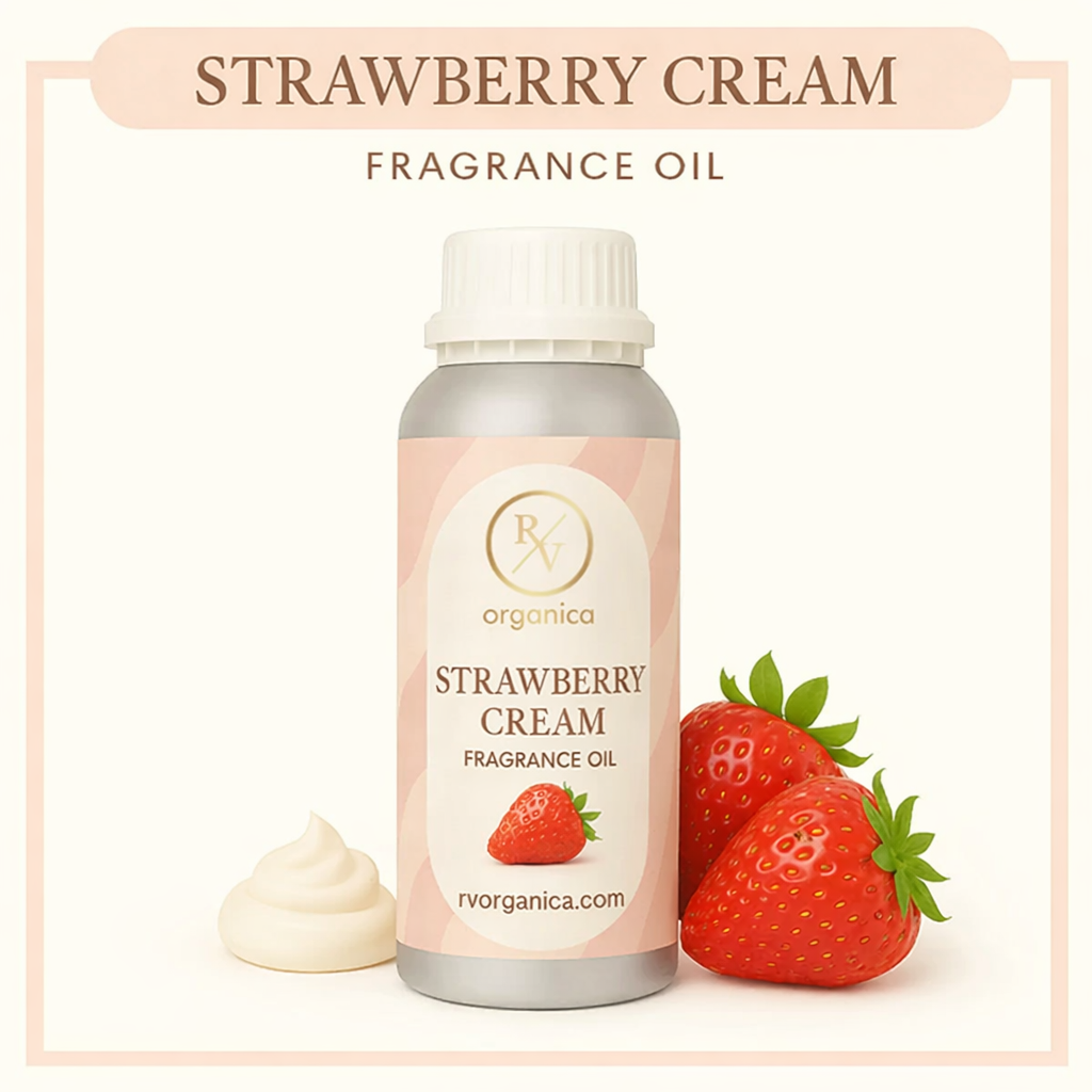 Strawberry cream fragrance oil bottle with strawberries and whipped cream on a light pink background